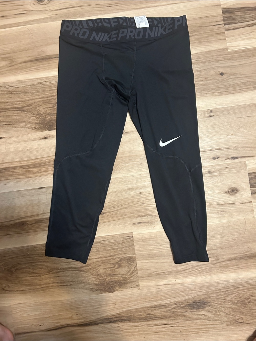Nike Black 3/4 Performance Compression Leggings with White Swoosh